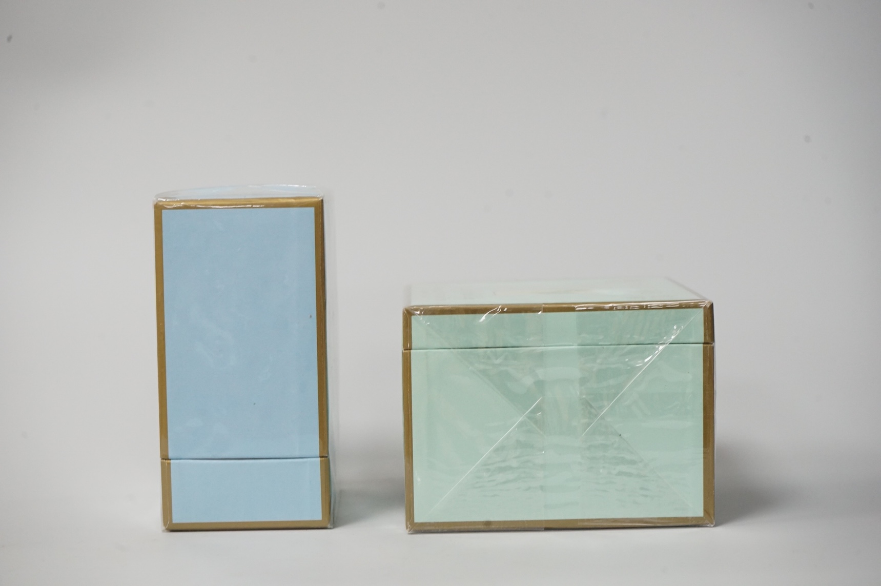 Three bottle of ladies unopened Floris perfumes comprising two bottles of Fleur and one bottle of Special No. 127, together with Floris Lily of the Valley silken dusting powder, each boxed and cellophane wrapped